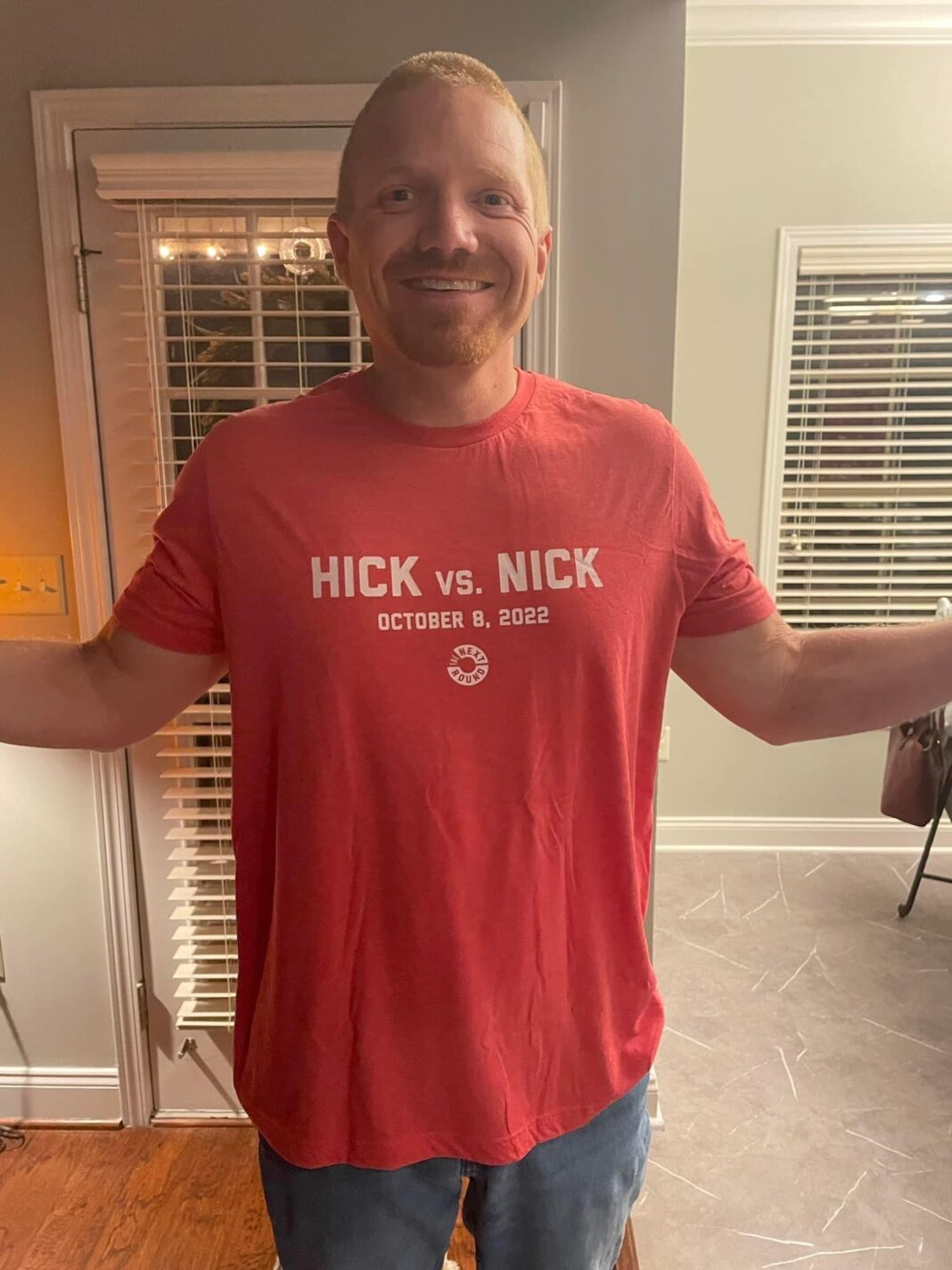 PHOTO: Brian Pope in “Hick vs Nick” Next Round T-Shirt